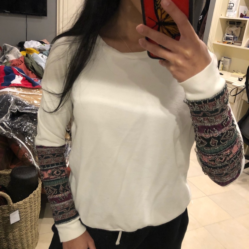 White long sleeve with embellishment